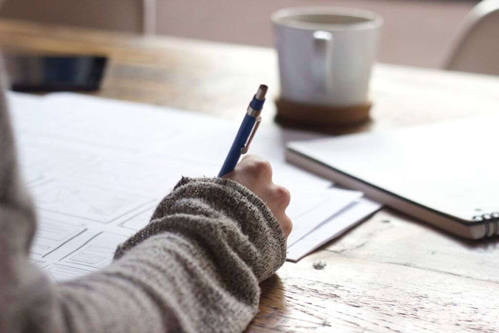 Person studying with focus and concentration at a desk